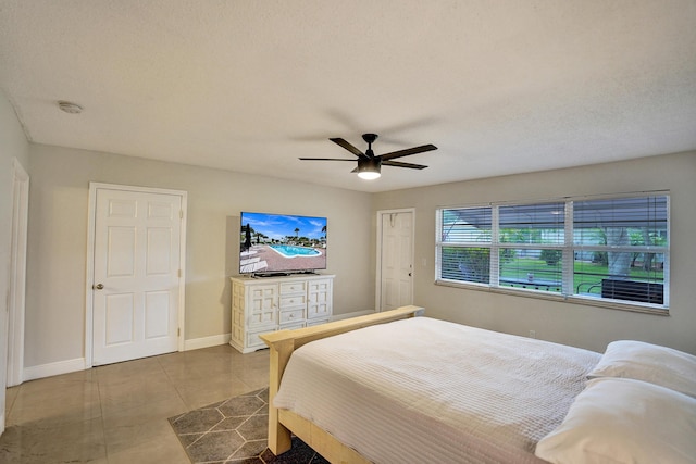 bedroom featuring ceiling fan