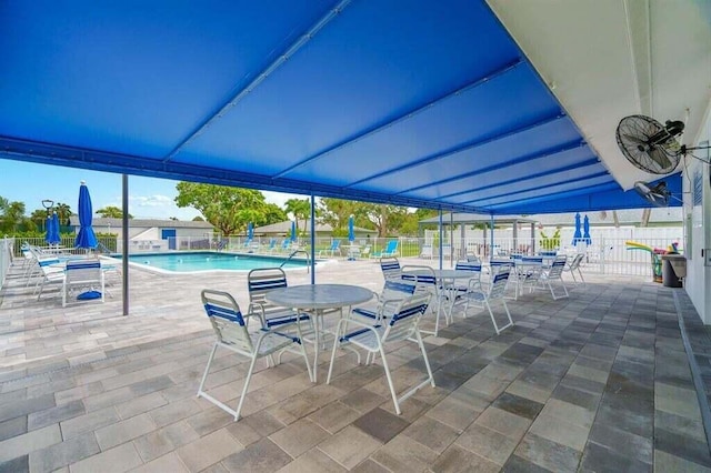 view of patio / terrace featuring a community pool