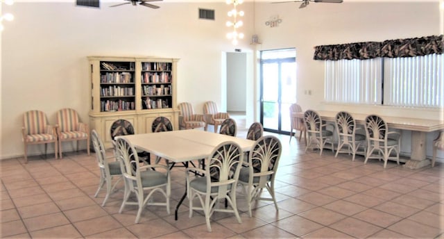 tiled dining area featuring ceiling fan