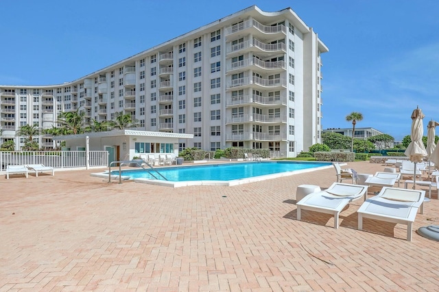 view of swimming pool featuring a patio