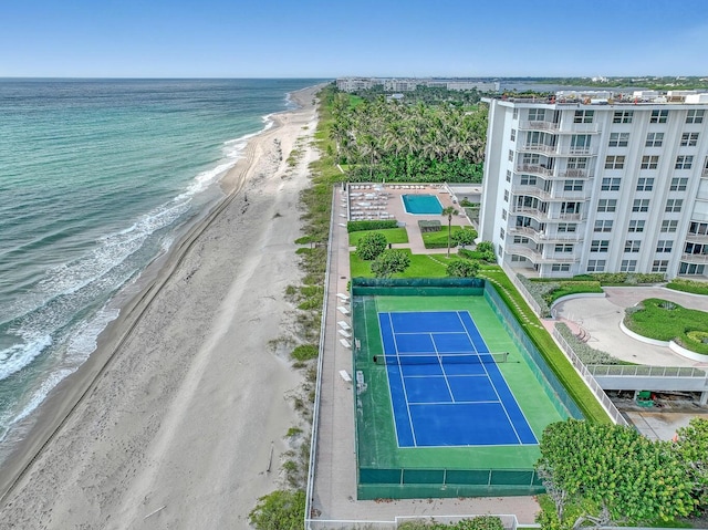 bird's eye view with a water view and a view of the beach