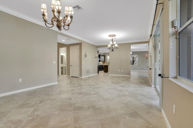 unfurnished dining area with ornamental molding, light tile patterned flooring, and an inviting chandelier