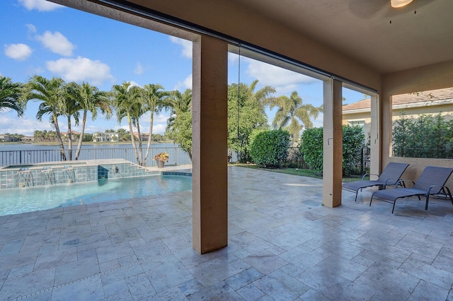 view of pool with pool water feature and a patio area