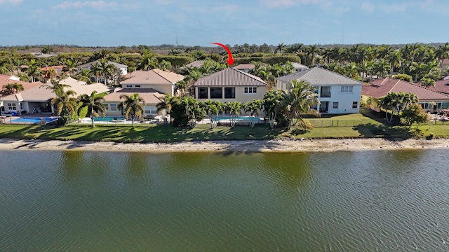 birds eye view of property featuring a water view