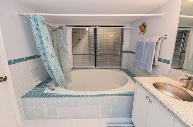 bathroom with tile patterned flooring, vanity, and shower / bath combo