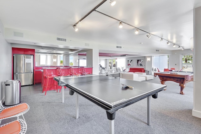 game room with light colored carpet and pool table