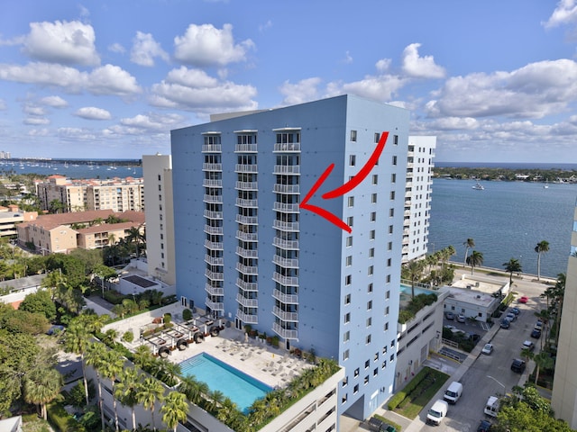 birds eye view of property featuring a water view