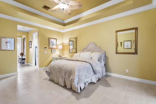 bedroom with ceiling fan, light tile patterned floors, a raised ceiling, and ornamental molding