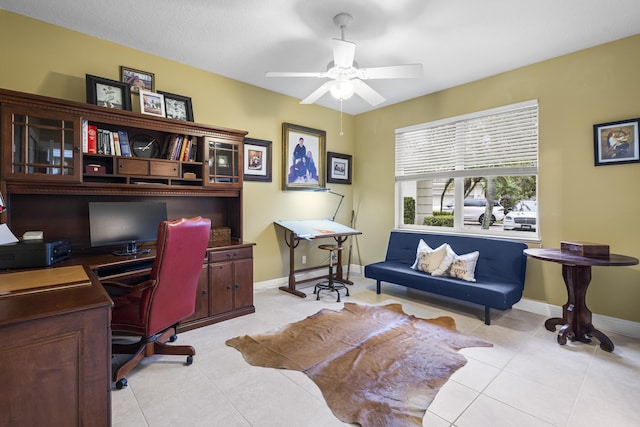 office space featuring ceiling fan and light tile patterned floors