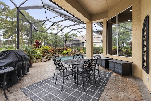 view of patio with a lanai