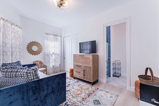 bedroom with light hardwood / wood-style floors