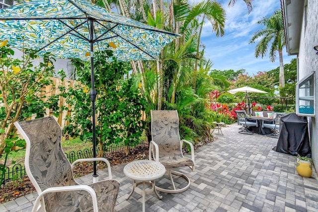 view of patio featuring outdoor dining area