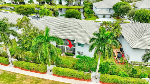 bird's eye view featuring a residential view and a water view