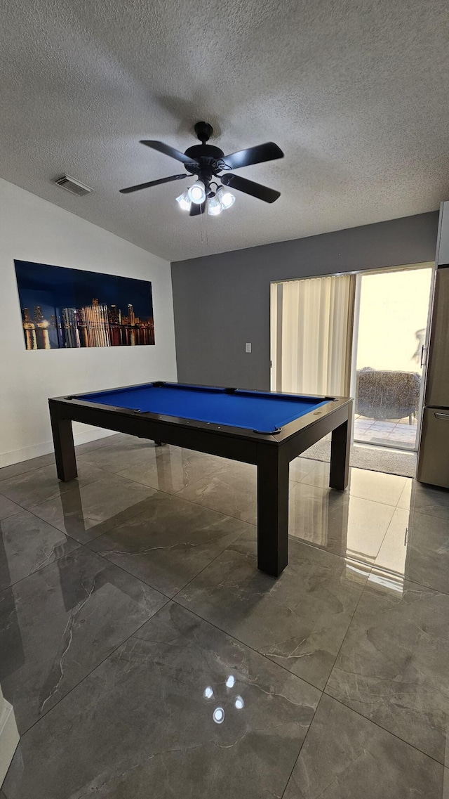 playroom with a textured ceiling, ceiling fan, and billiards