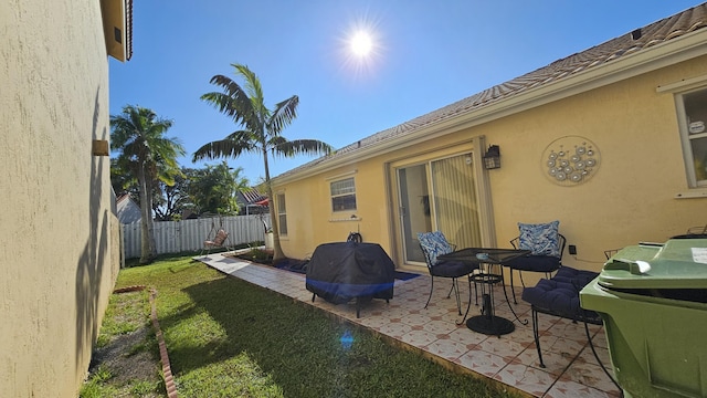 view of patio / terrace featuring a grill