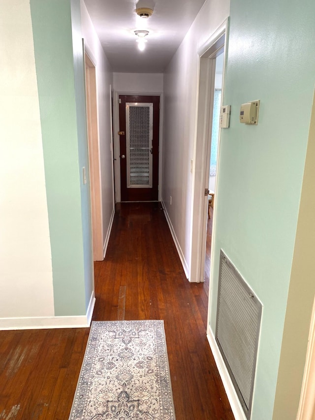 hall featuring dark hardwood / wood-style floors