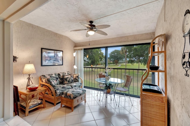 interior space with ceiling fan and lofted ceiling