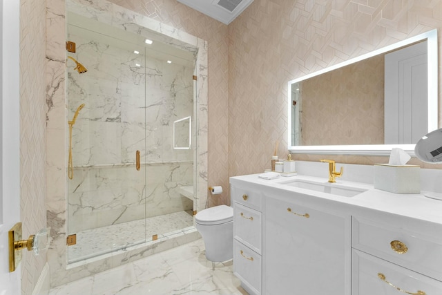 bathroom with a shower with shower door, vanity, and toilet