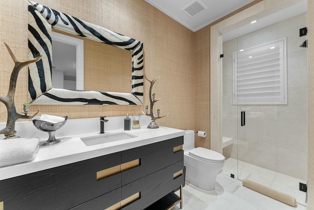 bathroom featuring walk in shower, tile patterned flooring, vanity, and toilet