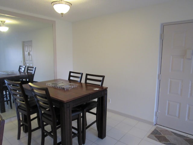 view of tiled dining area