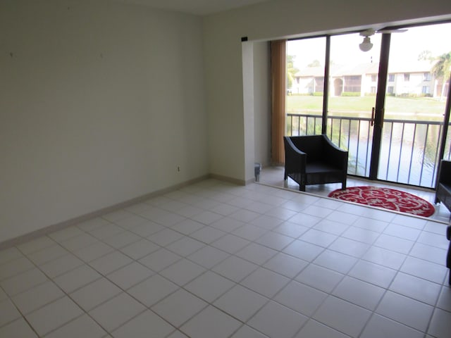 living area with light tile patterned floors