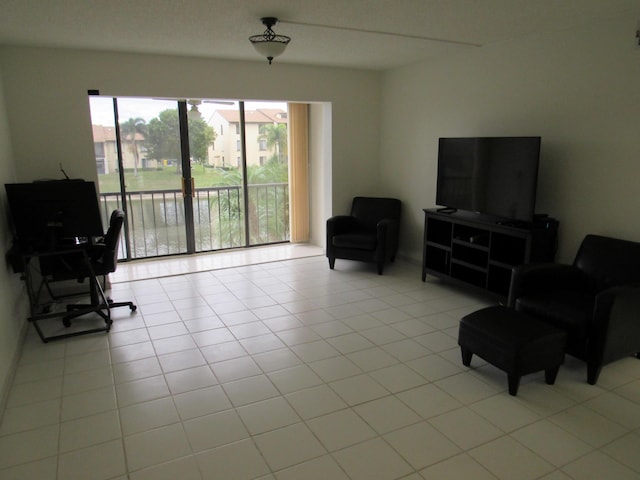 living area with light tile patterned flooring