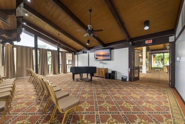 interior space with ceiling fan, a healthy amount of sunlight, lofted ceiling with beams, and wooden ceiling