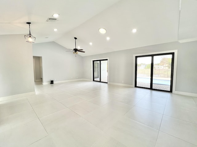 spare room with light tile patterned floors, high vaulted ceiling, and ceiling fan