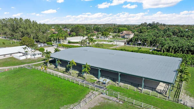 birds eye view of property with a rural view