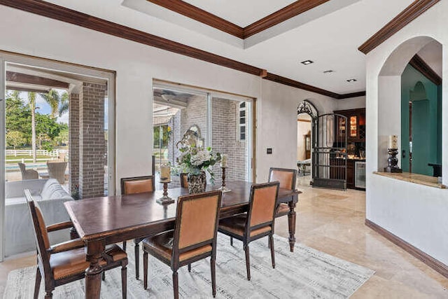 dining area with ornamental molding