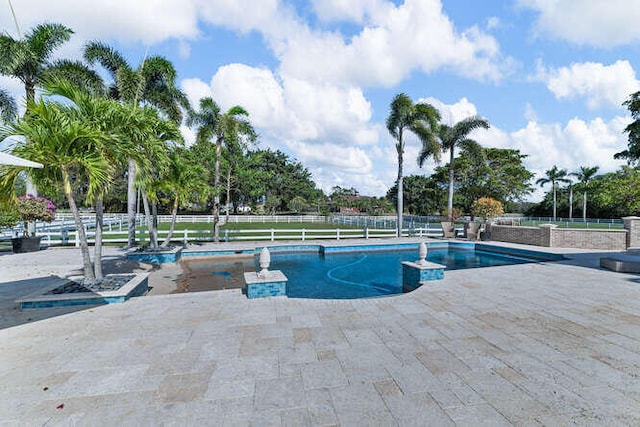 view of pool featuring a patio area