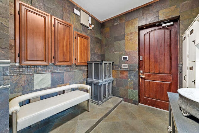 bathroom featuring tile walls