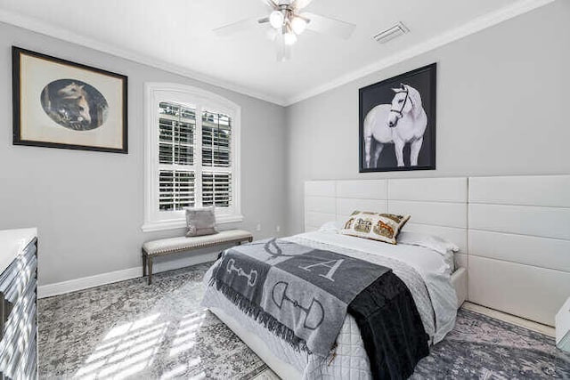 bedroom with ceiling fan and ornamental molding