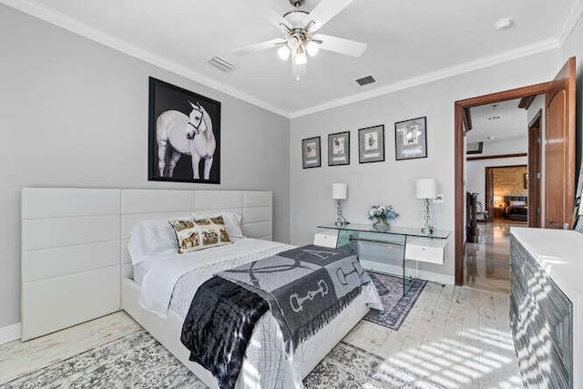 bedroom featuring crown molding and ceiling fan