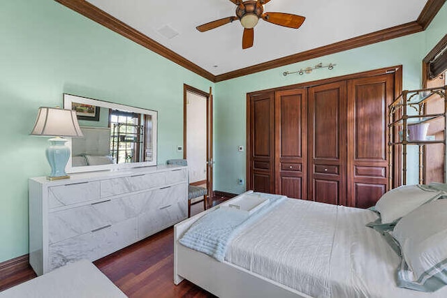 bedroom featuring crown molding and dark hardwood / wood-style flooring