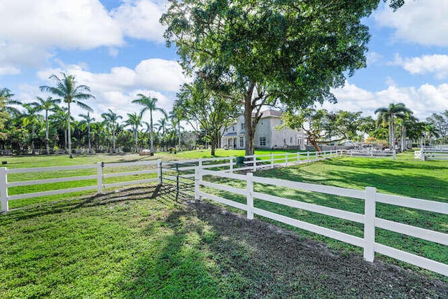 view of yard with a rural view