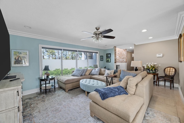 living room with ceiling fan and ornamental molding