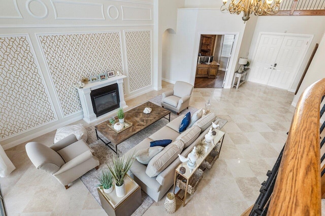 living room featuring an inviting chandelier