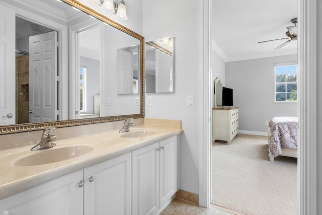 bathroom featuring vanity, ceiling fan, and crown molding