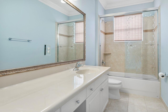 full bathroom with toilet, crown molding, tile patterned floors, vanity, and shower / bath combination with glass door