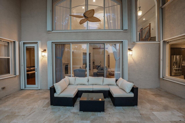 view of patio / terrace featuring ceiling fan and an outdoor hangout area