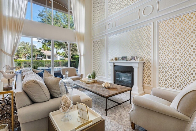 living room with a towering ceiling