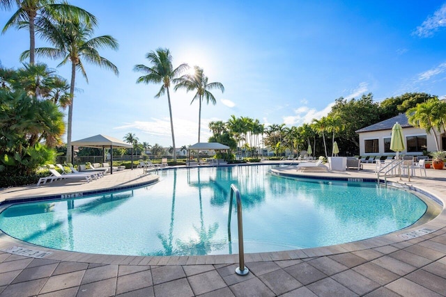 view of swimming pool featuring a gazebo and a patio