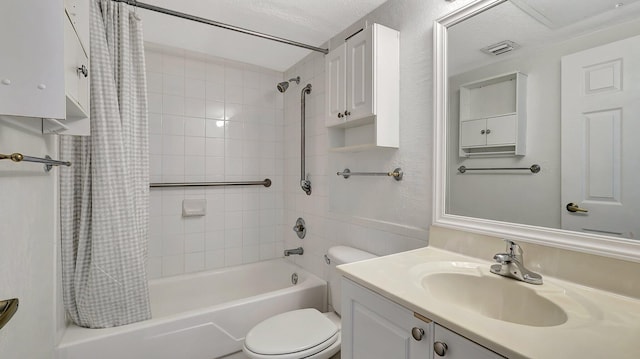 full bathroom with toilet, vanity, and shower / tub combo with curtain