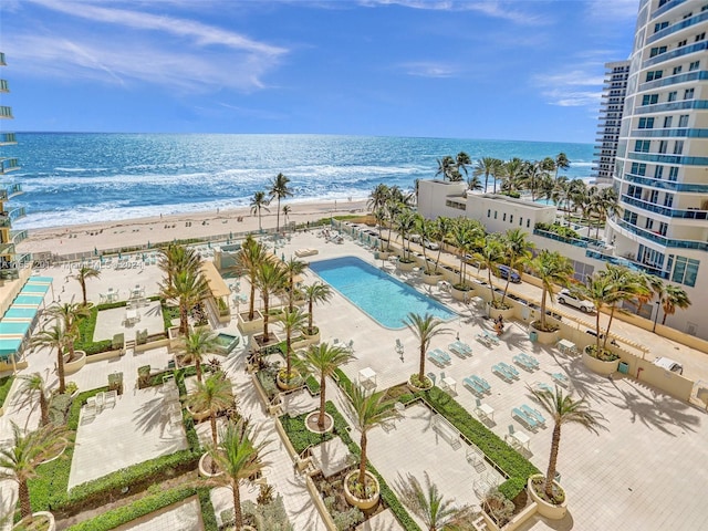 view of pool featuring a water view