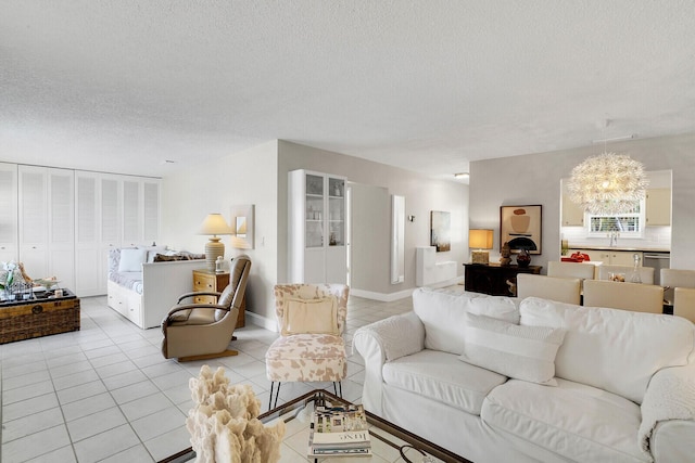 tiled living room featuring a textured ceiling