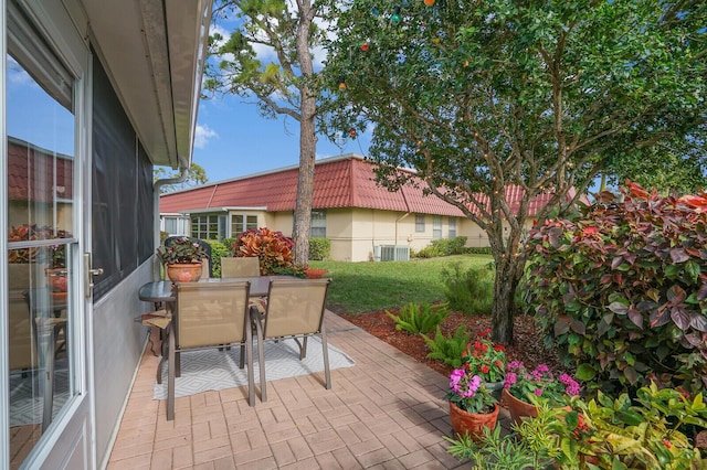 view of patio featuring central AC