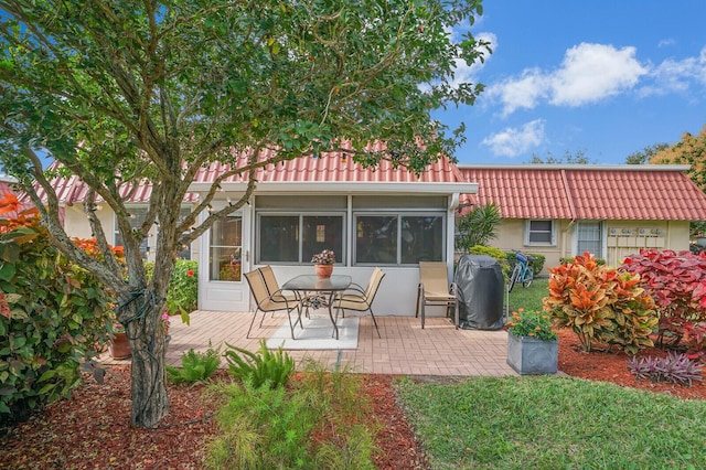 back of house featuring a patio area