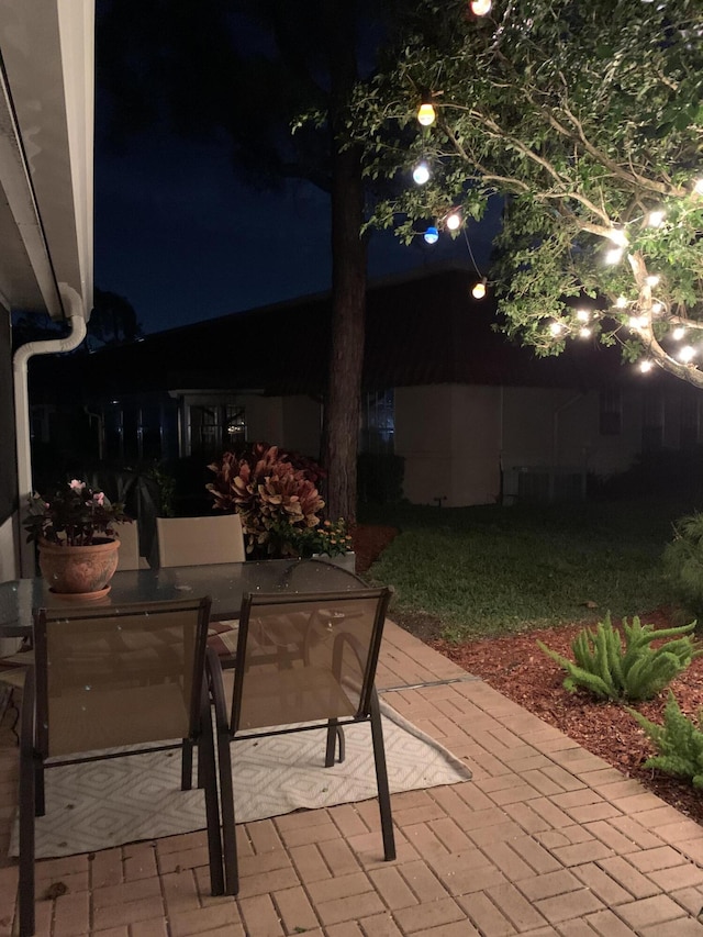 view of patio at twilight