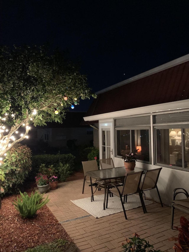 view of patio at twilight